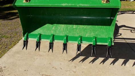 tooth bar for tractor bucket